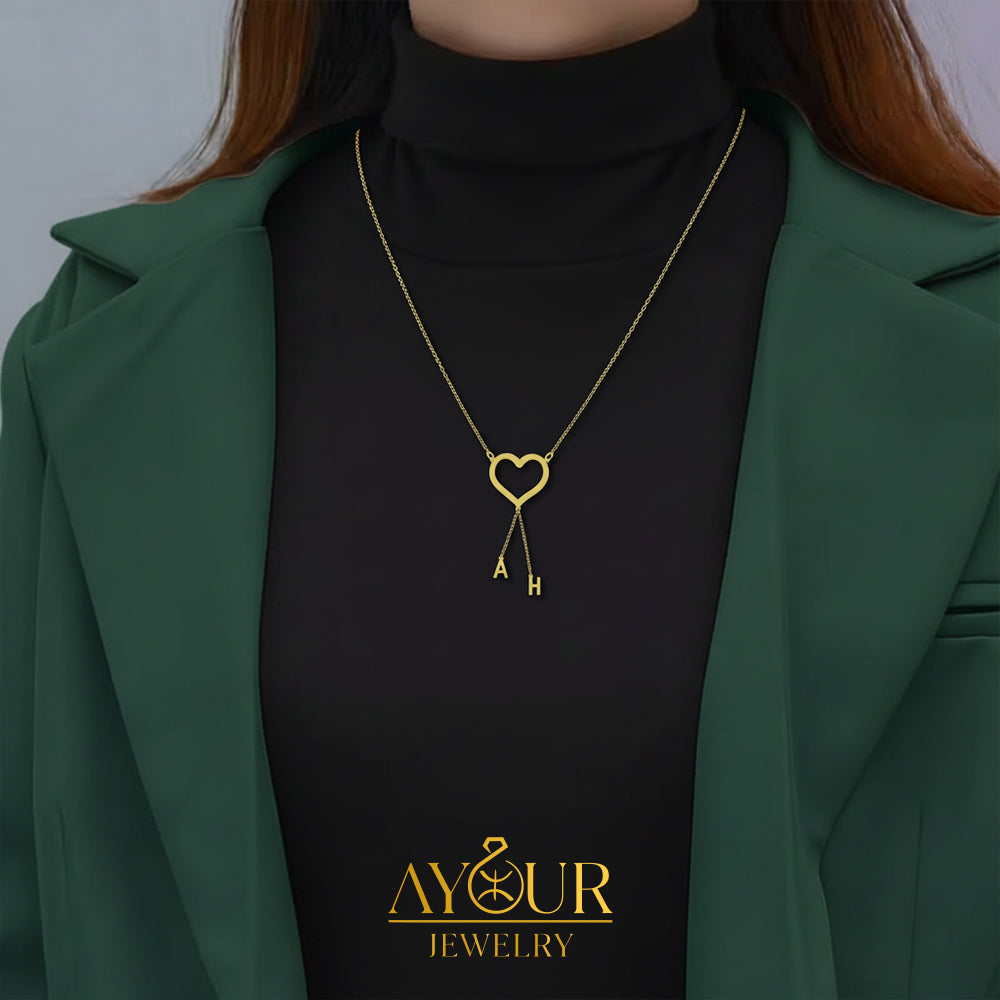 Collier cœur doré avec deux initiales personnalisées en argent 925 sur chaîne fine – bijou romantique femme.
