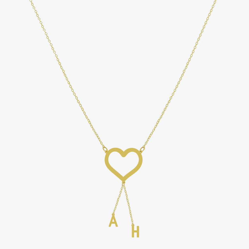 Collier cœur doré avec deux initiales personnalisées en argent 925 sur chaîne fine – bijou romantique femme.