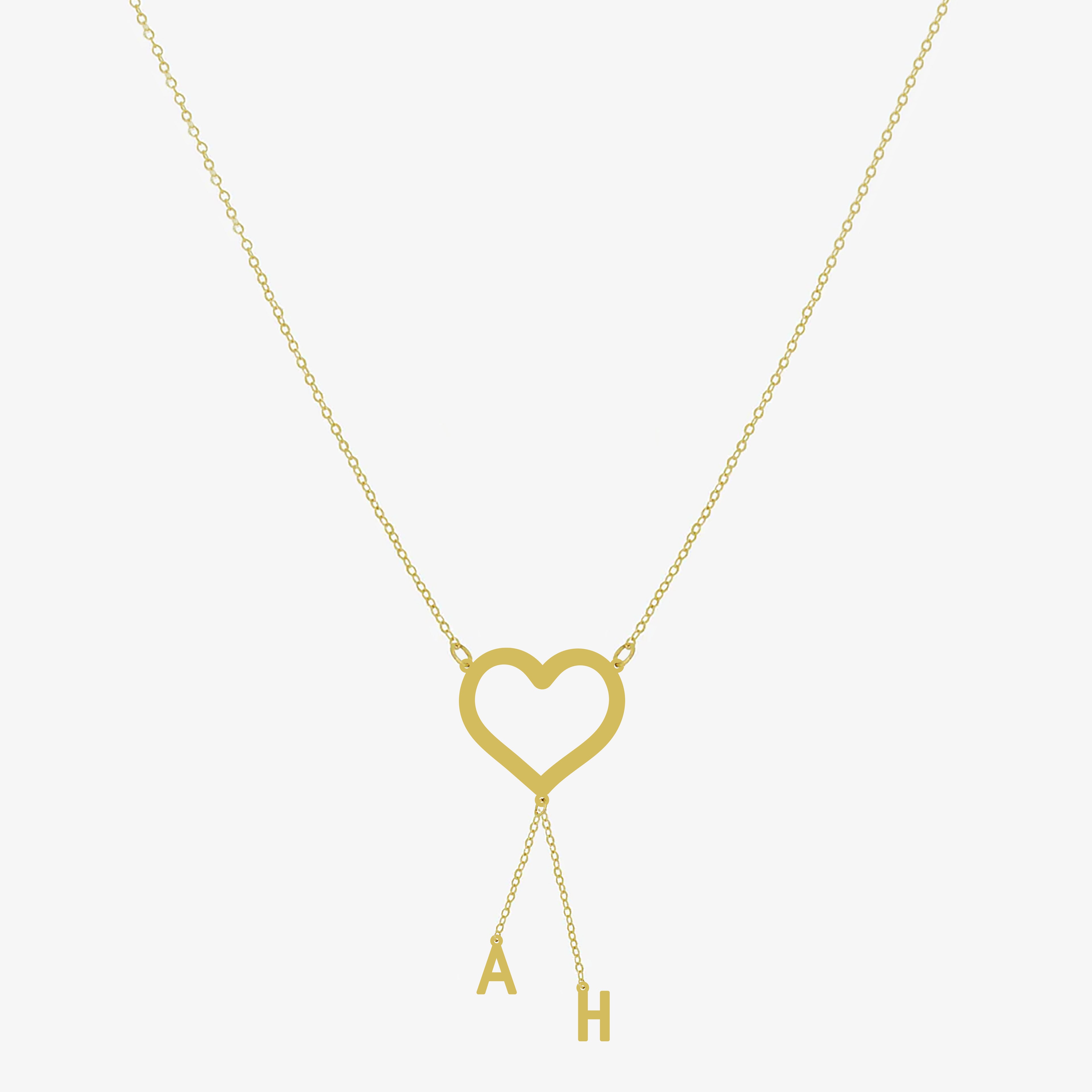 Collier cœur doré avec deux initiales personnalisées en argent 925 sur chaîne fine – bijou romantique femme.