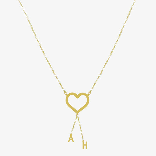 Collier cœur doré avec deux initiales personnalisées en argent 925 sur chaîne fine – bijou romantique femme.